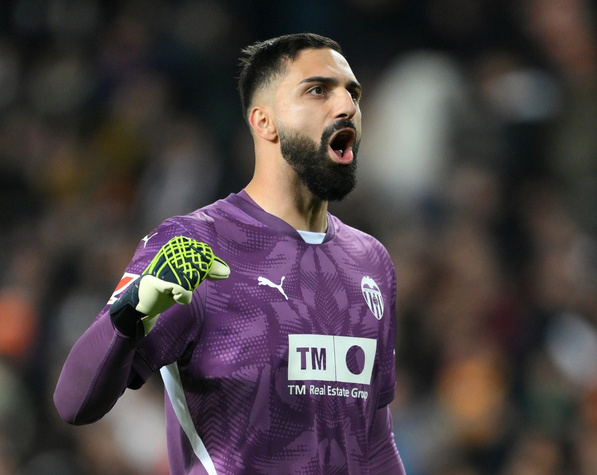 Valencia goalkeeper Giorgi Mamardashvili celebrates