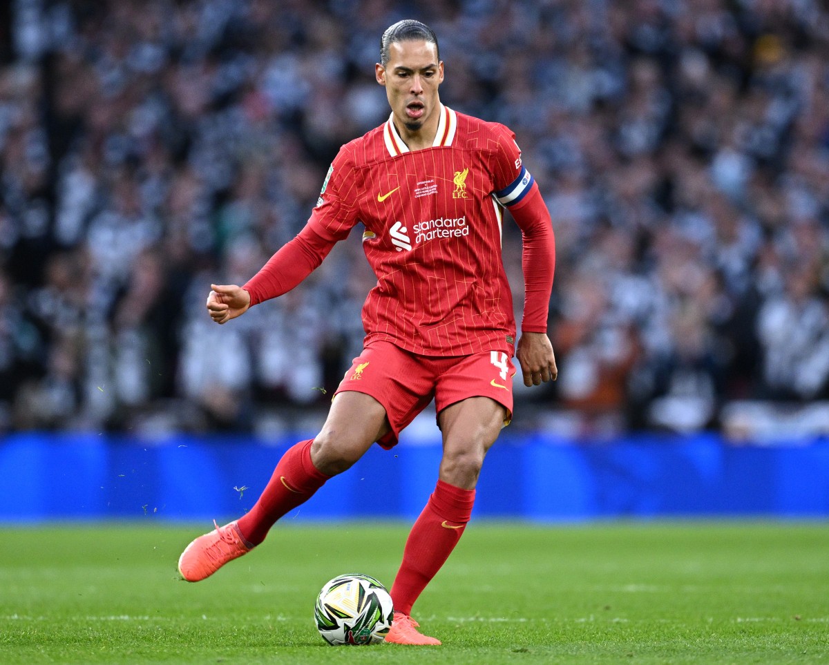 Virgil Van Dijk in Liverpool's action against Newcastle