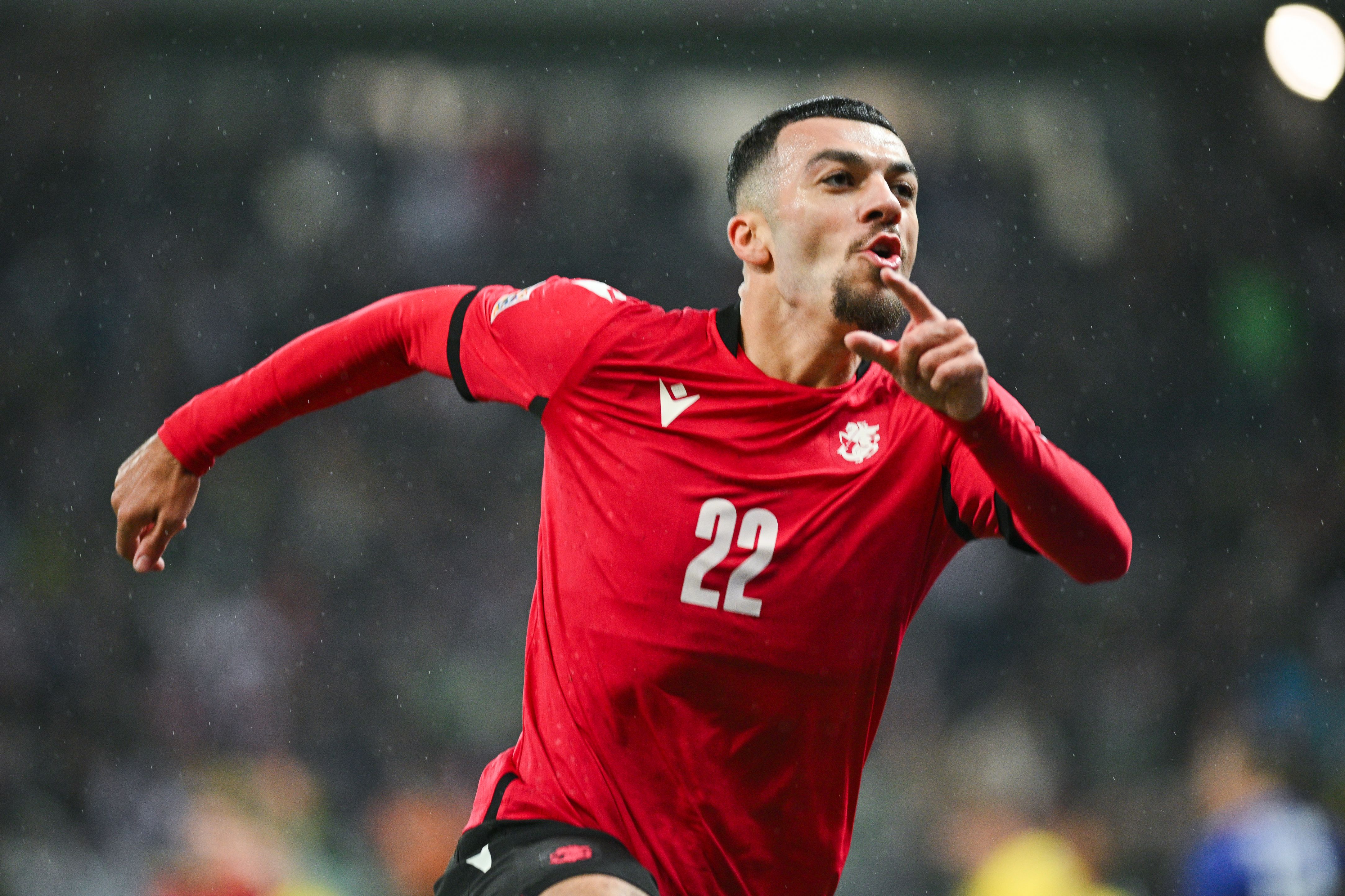 Georges Mikaudze of Georgia celebrates its goal