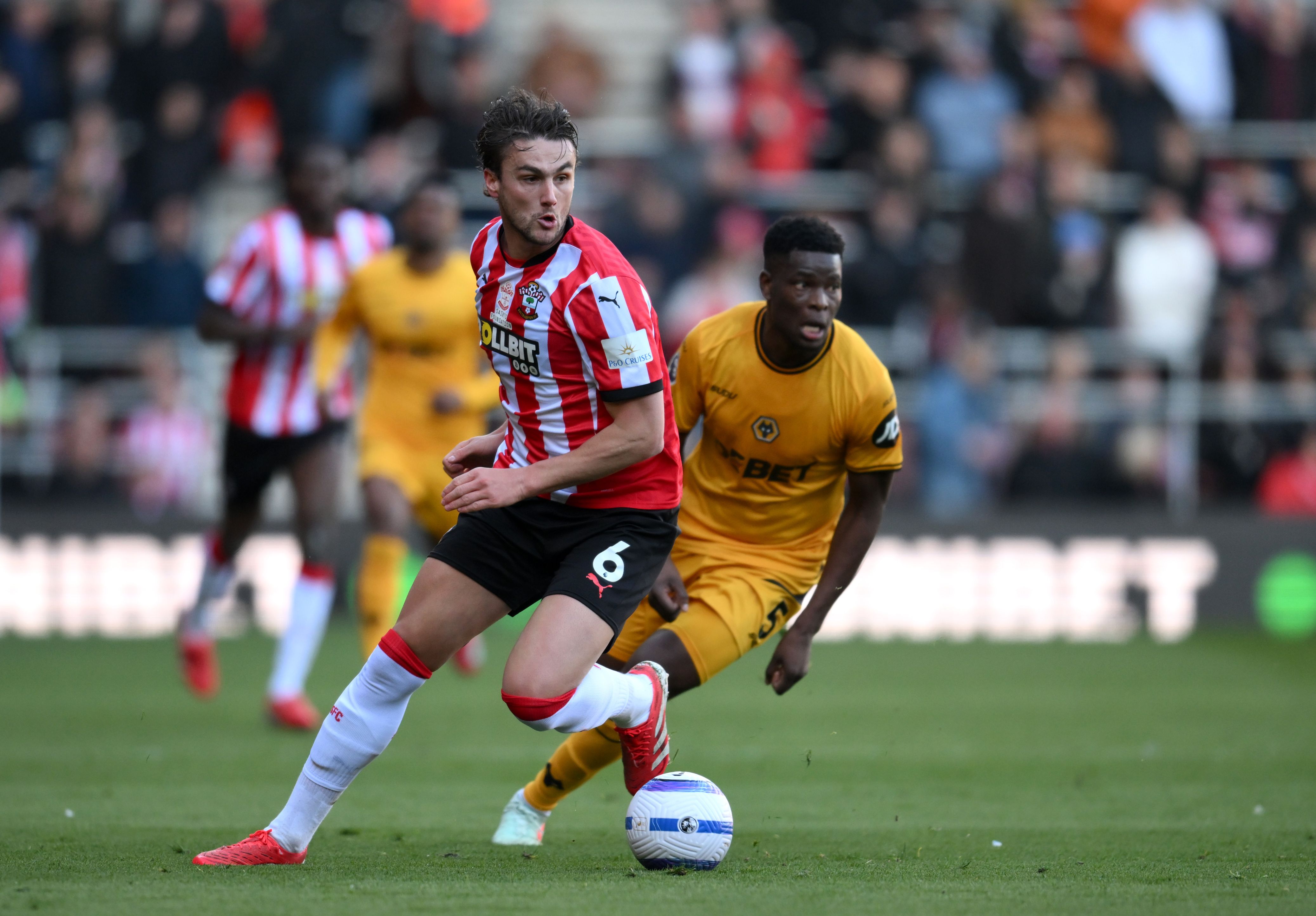 Taylor Harwood-Bellis from Southampton runs a ball