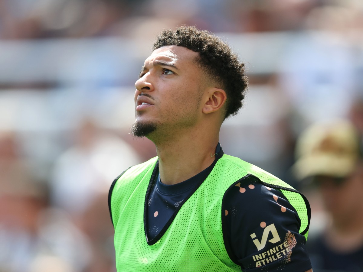 Chelsea's Jadon Sancho looks on from the substitutes bench