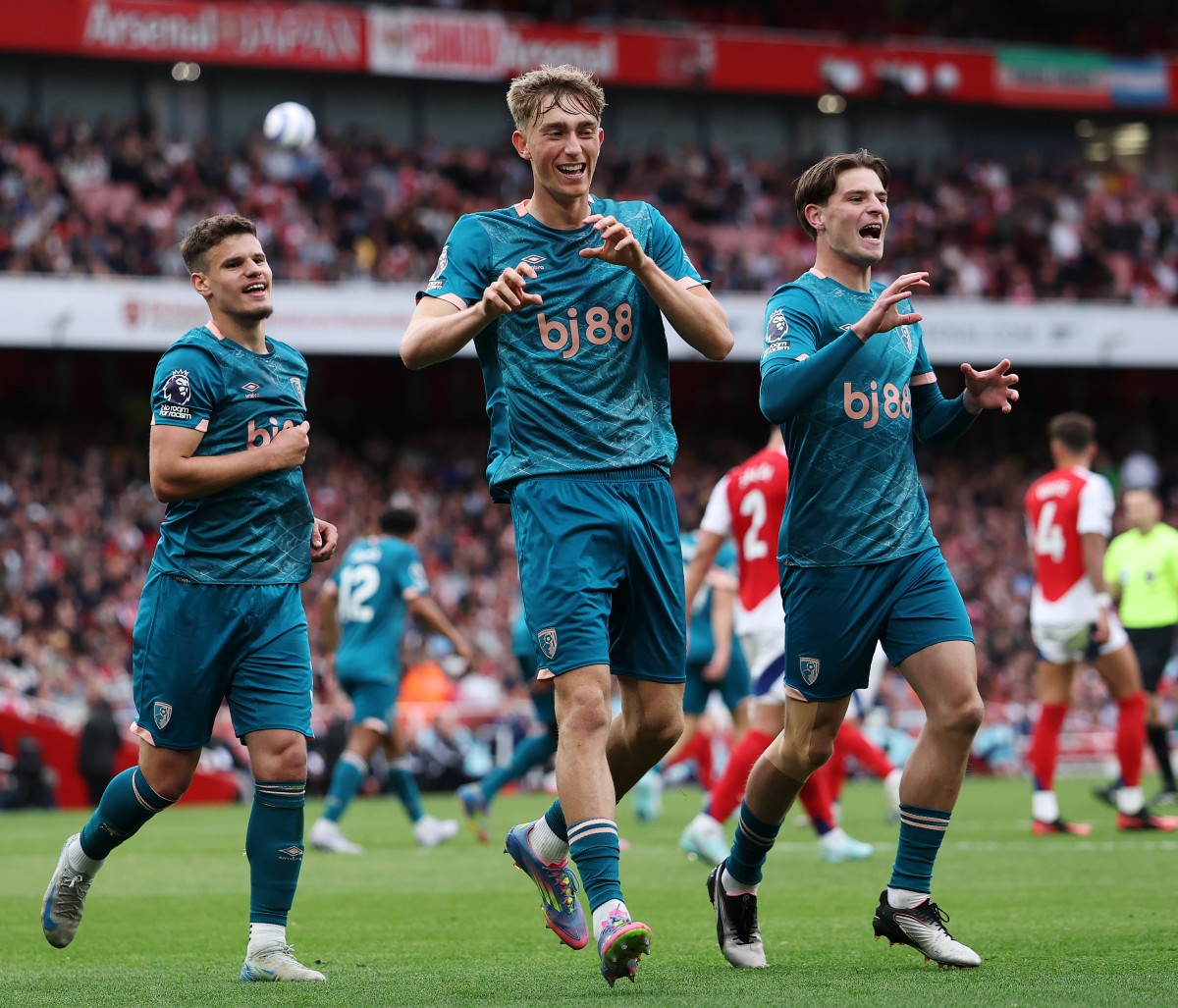 Dean Hujsen celebrates a goal for Bournemouth against Arsenal at Emirates Stadium