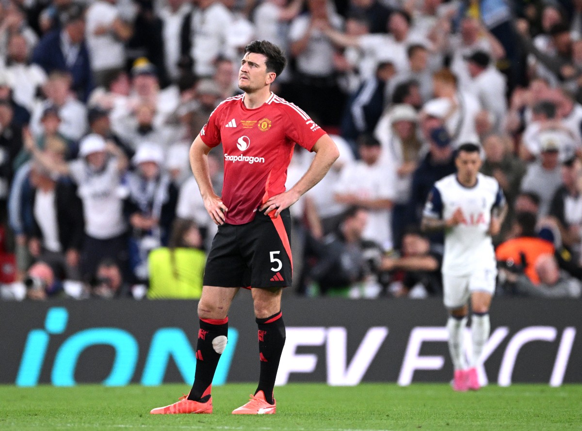 Harry Maguire reacts to the purpose of Tottenham