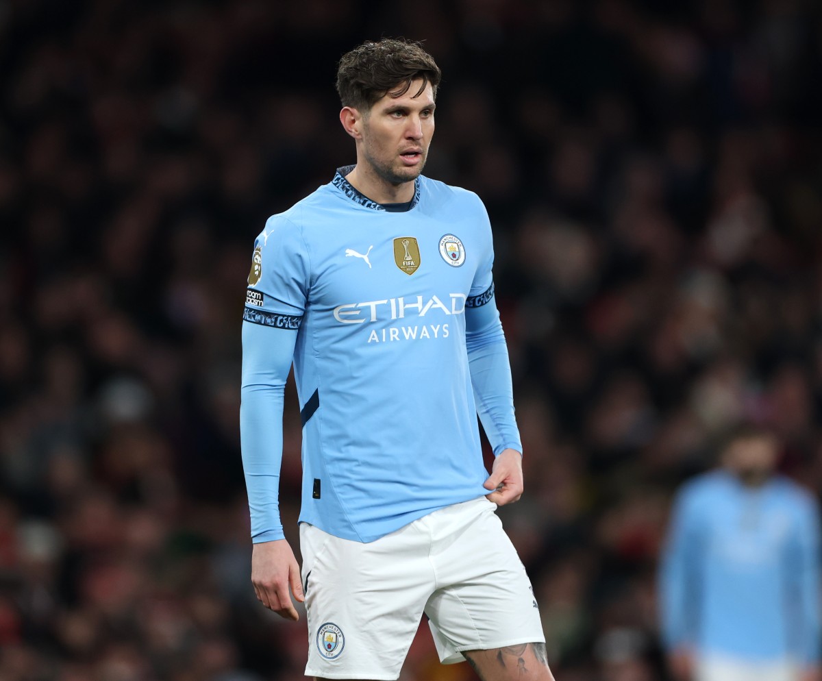 John Stones in action for Manchester City against Arsenal
