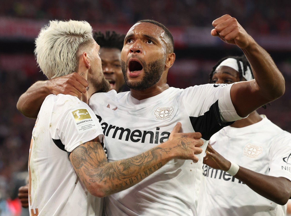 Jonathan Tah celebrates a goal for Bayer Leverkusen