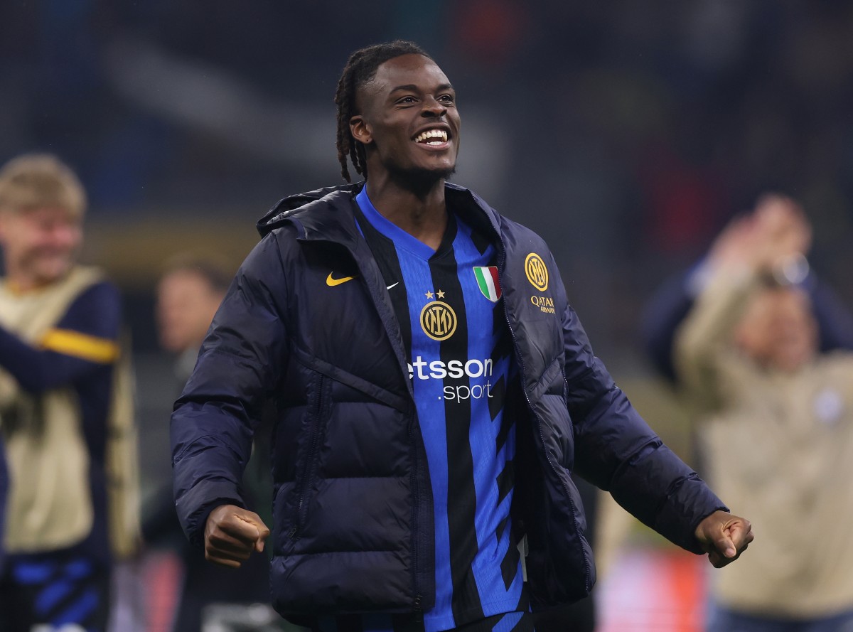 Yann Bisseck celebrates Inter Milan's win over Barcelona