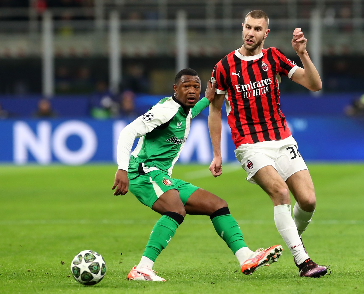 Zepiqueno Redmond in action for Feyenoord against AC Milan