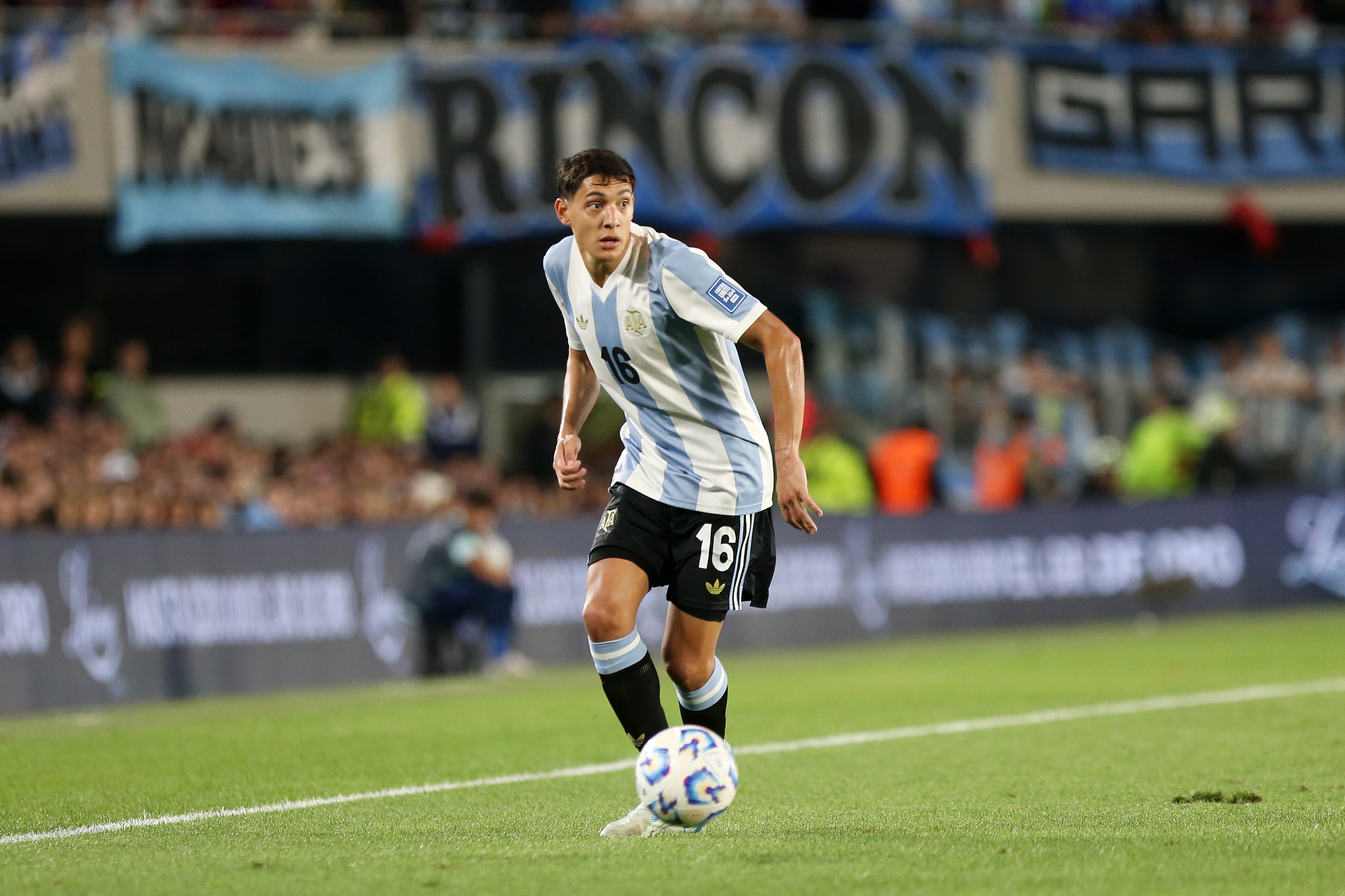 Nahuel Molina of Argentina controls the ball