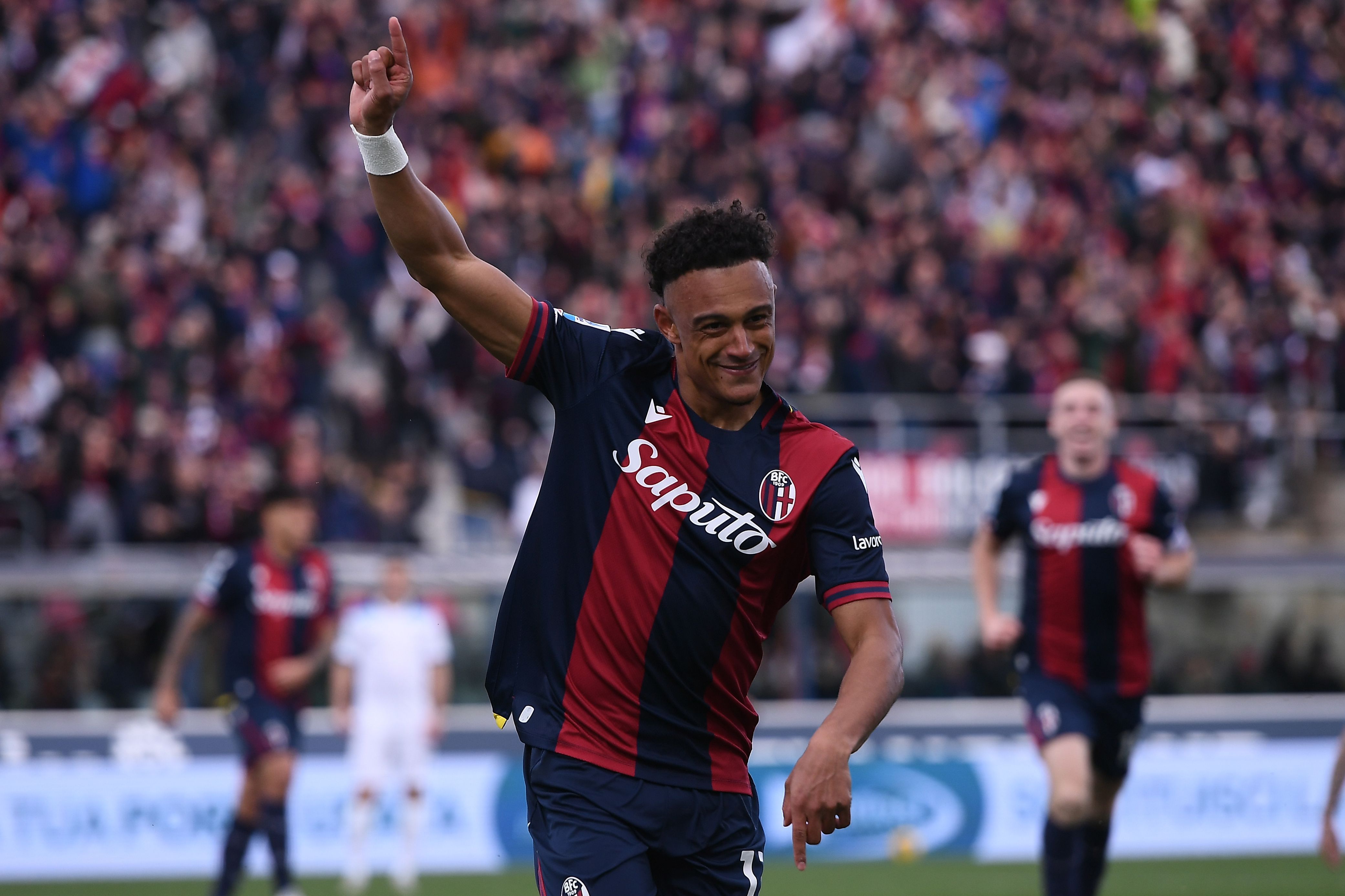 Dan Ndawi celebrates Bologna after registration