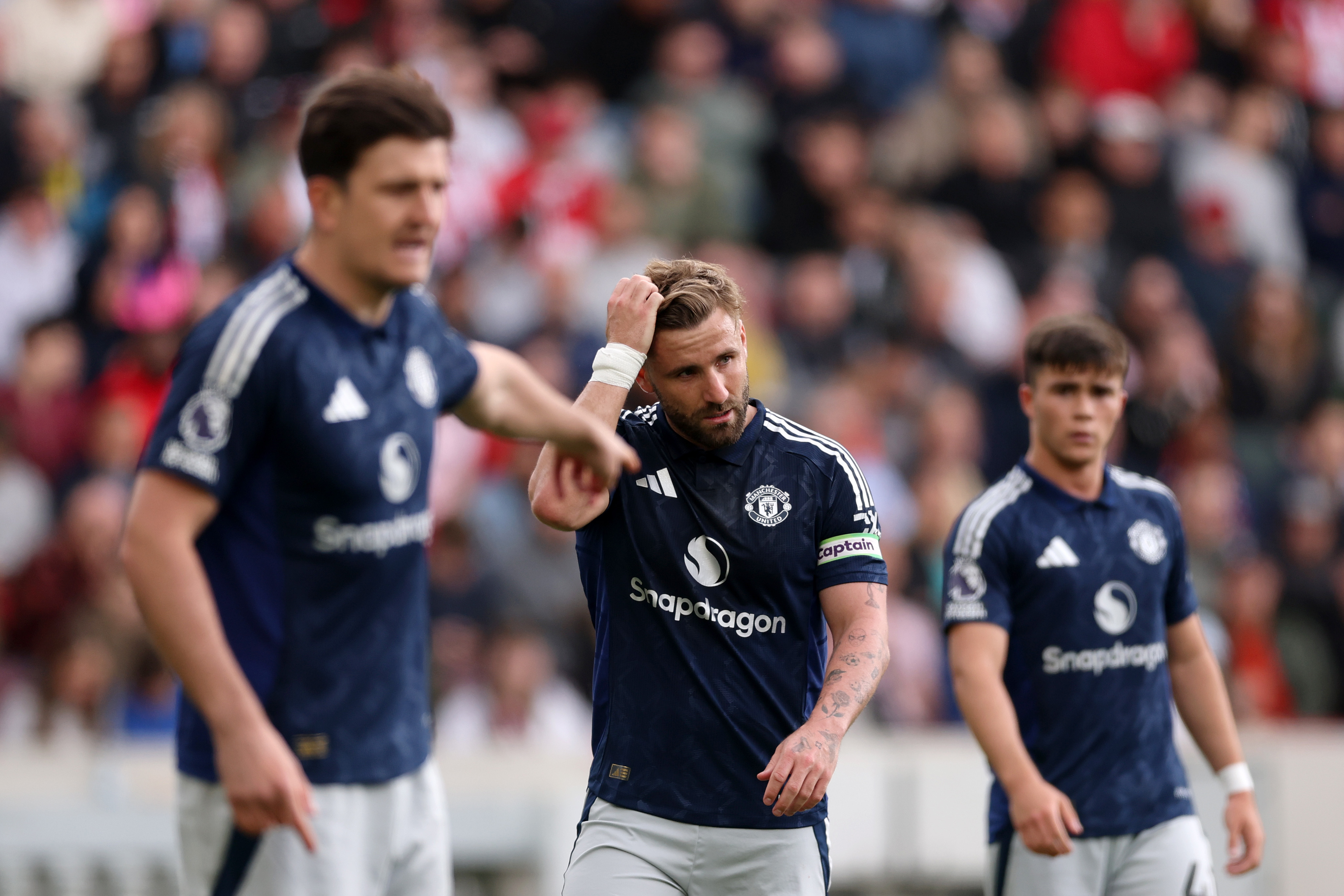 Luke Shaw reacts during the Premier League match between Brentford FC and Manchester United
