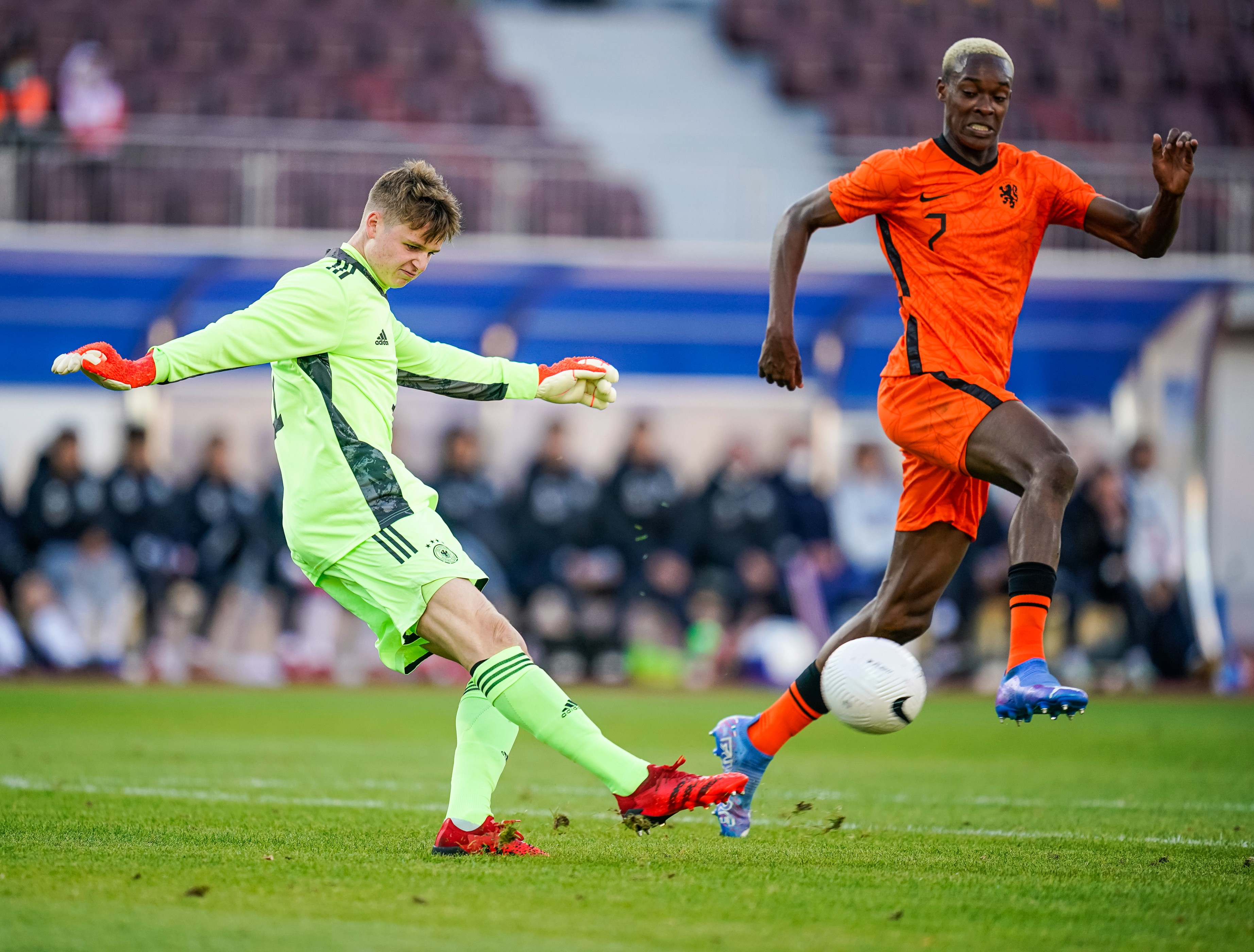 Goalkeeper Jonas Urbig of Germany U19 (L) in action against Emanuel Emegha of Netherlands U19