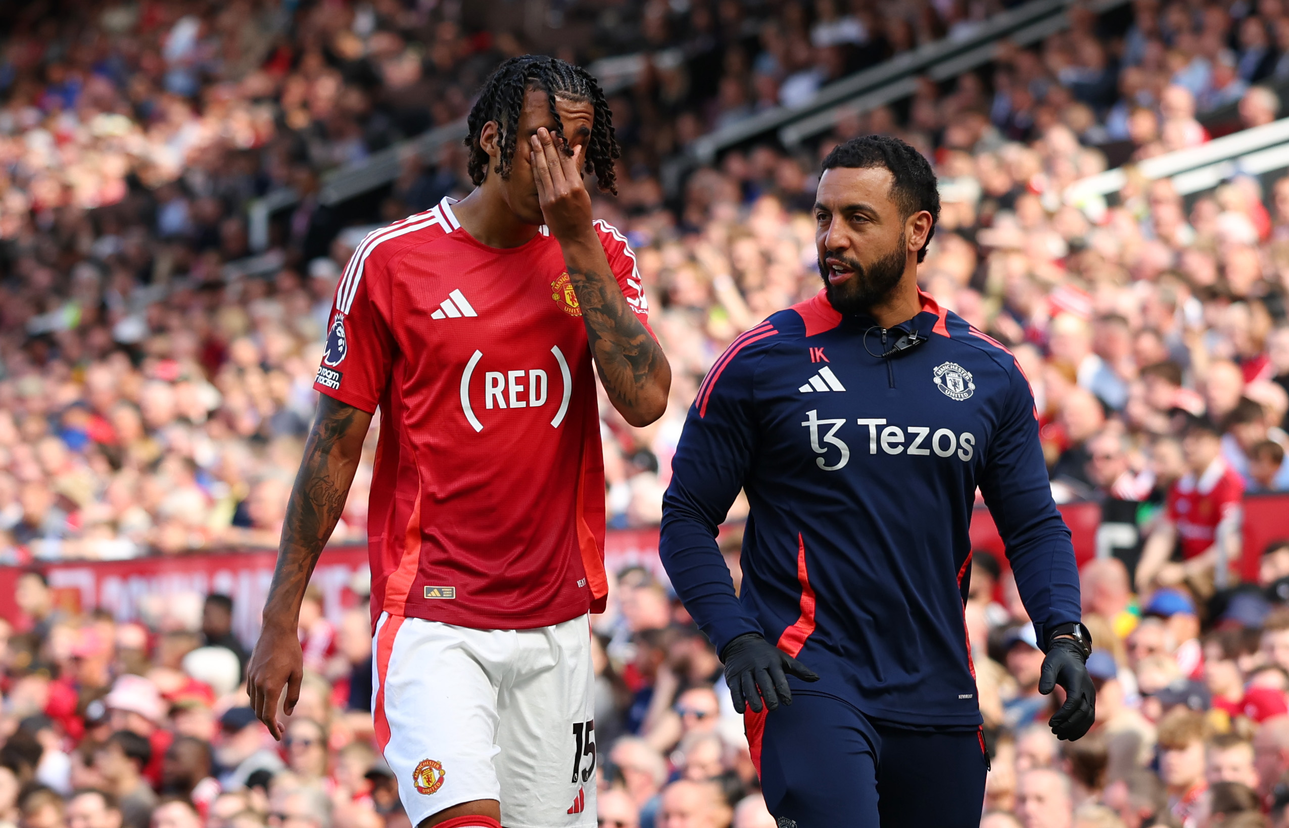 Leny Yoro of Manchester United is substituted off during a Premier League match