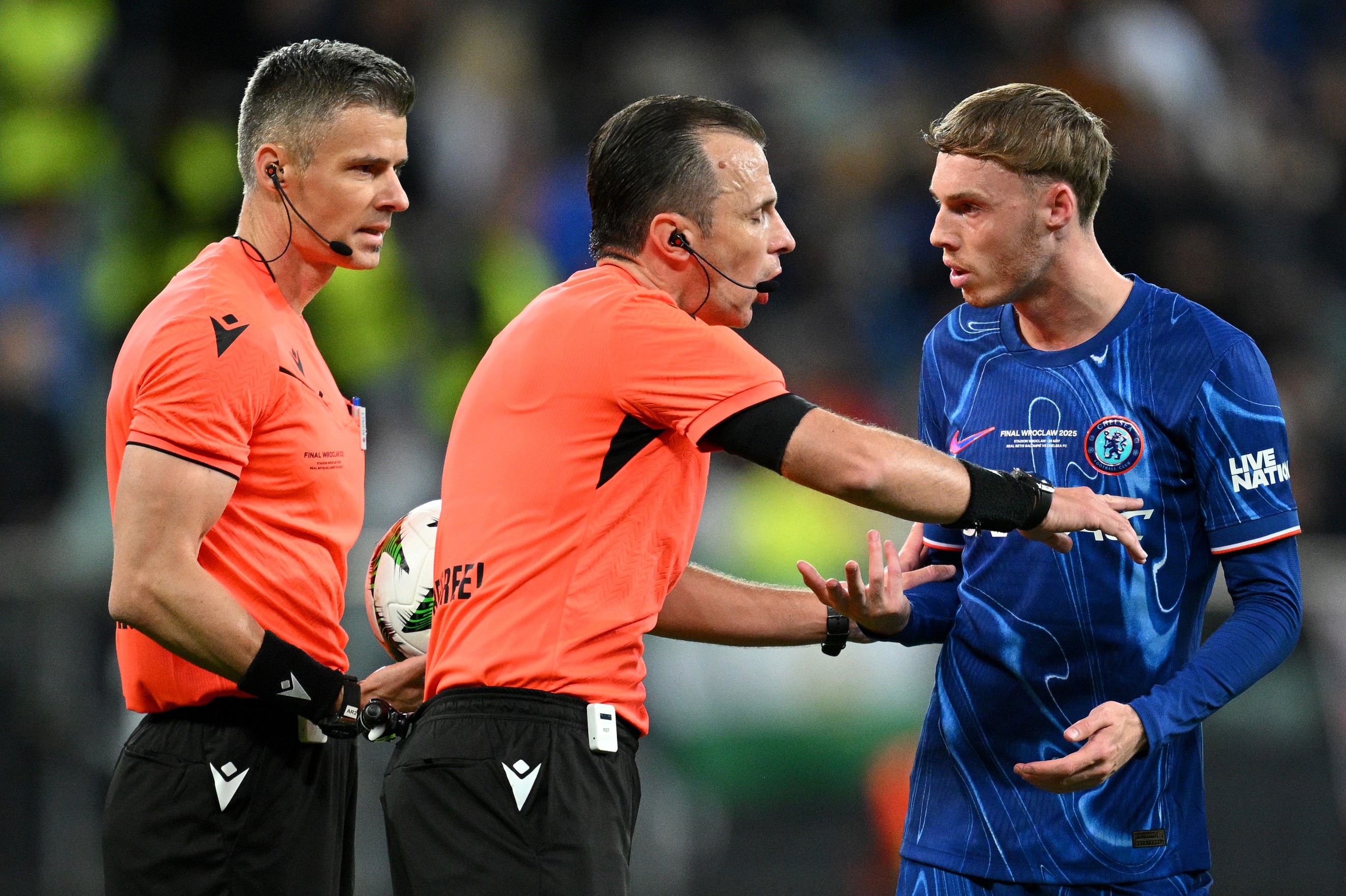 Referee Irfan Peljto speaks to Cole Palmer of Chelsea during the UEFA Conference League Final