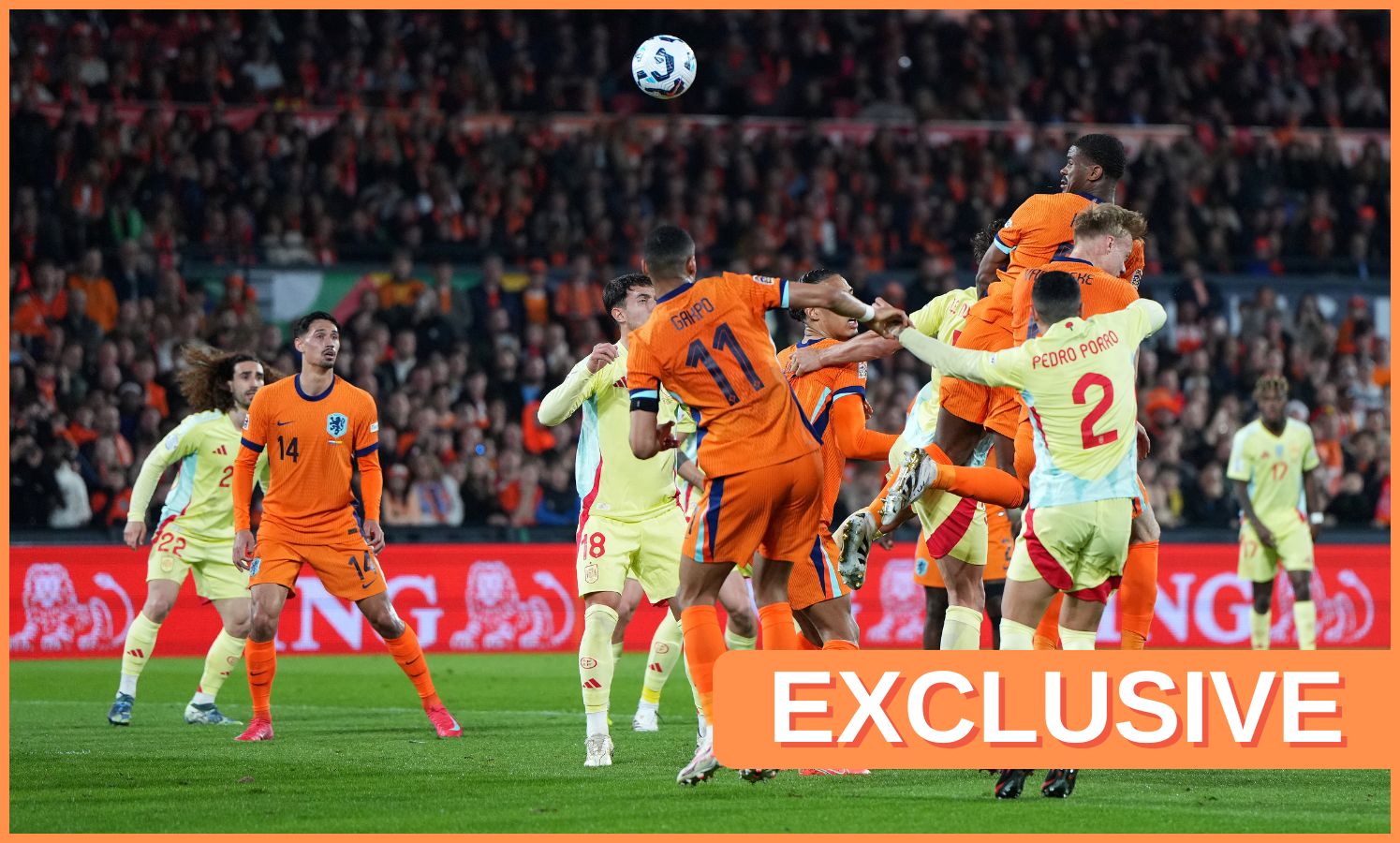 Netherlands vs Spain action shot, plus 'exclusive' banner