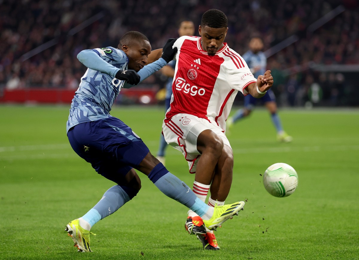 Jorrel Hato in action for Ajax against Aston Villa in 2024