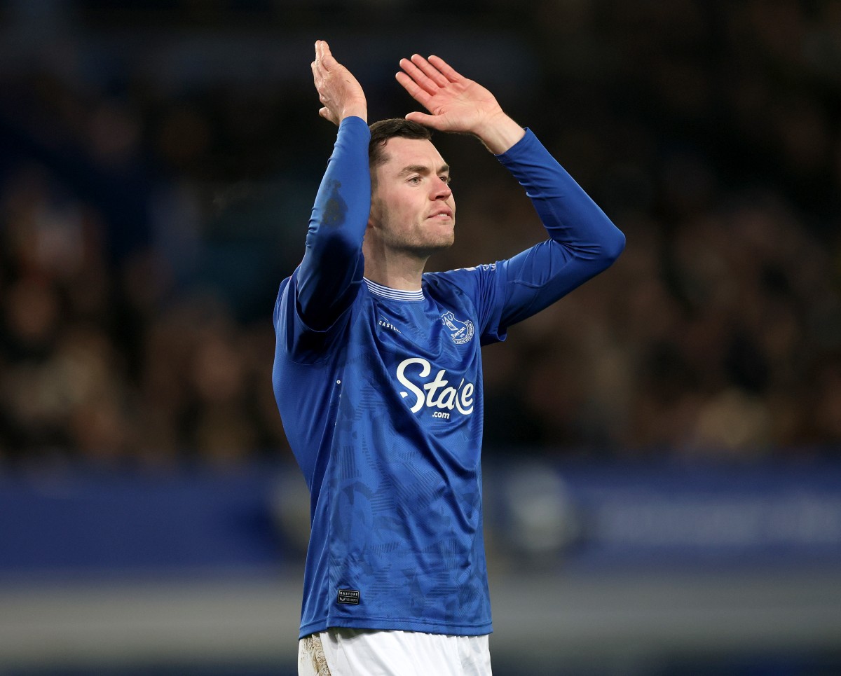 Michael Keane applauds the Everton fans