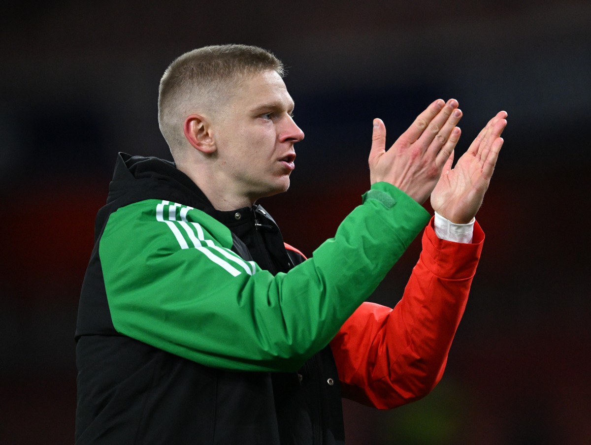 Oleksandr Zinchenko applauds the fans