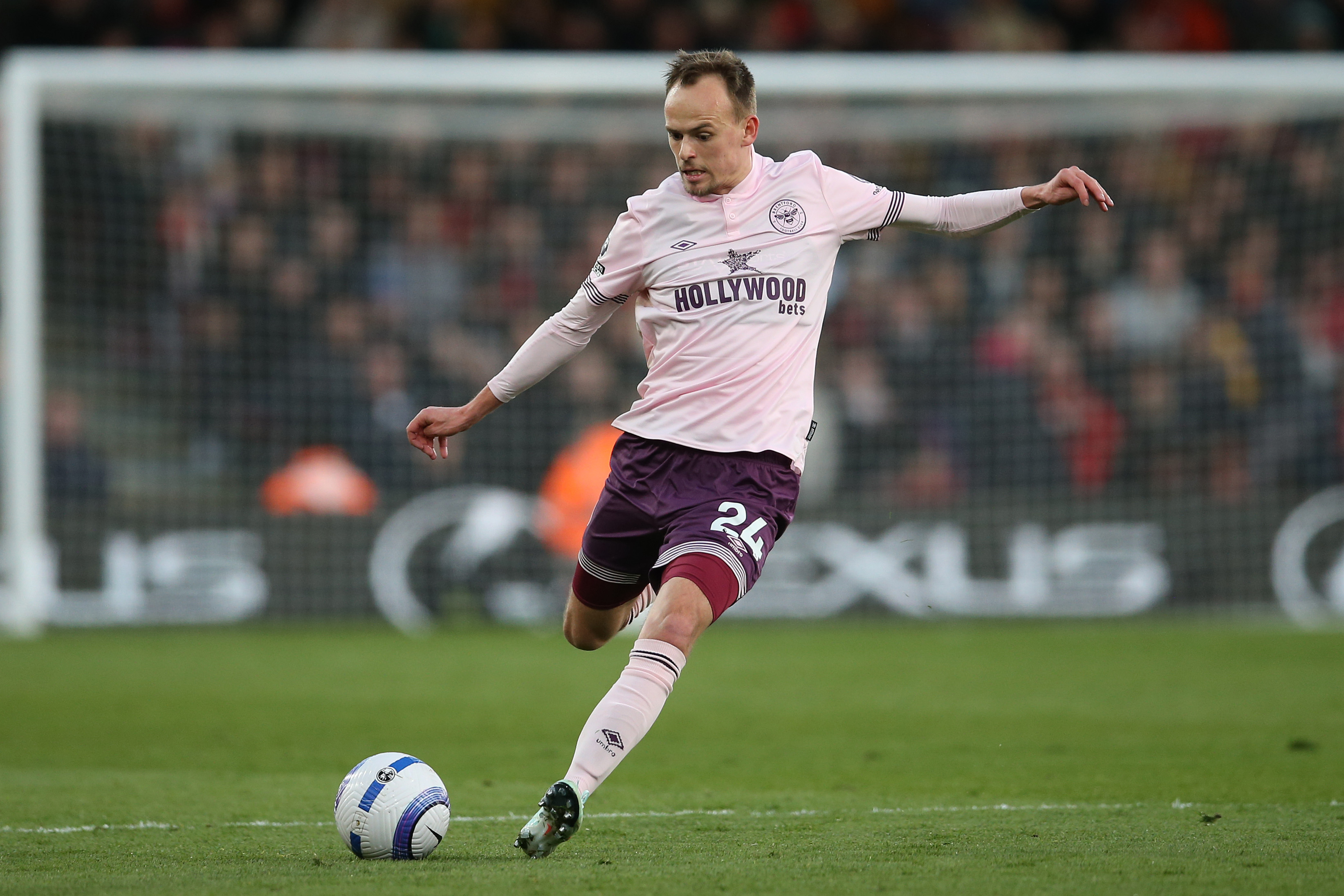 Mikkel Damsgaard from Brentford passes the ball during the Premier League match