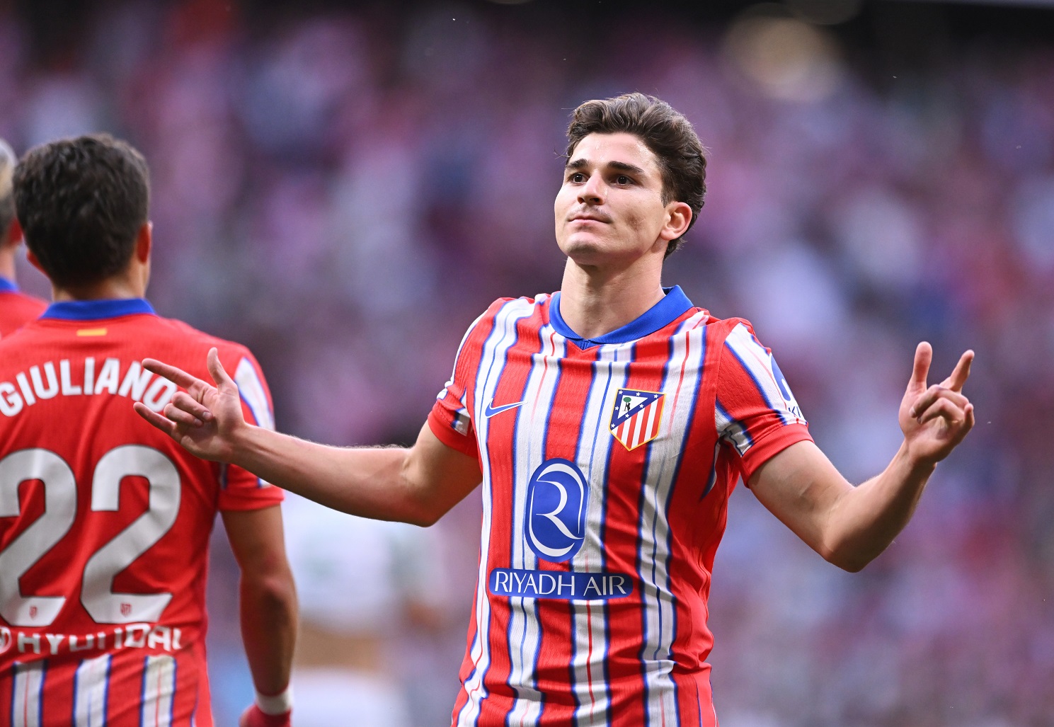 Julian Alvarez celebrates a goal for Atletico Madrid