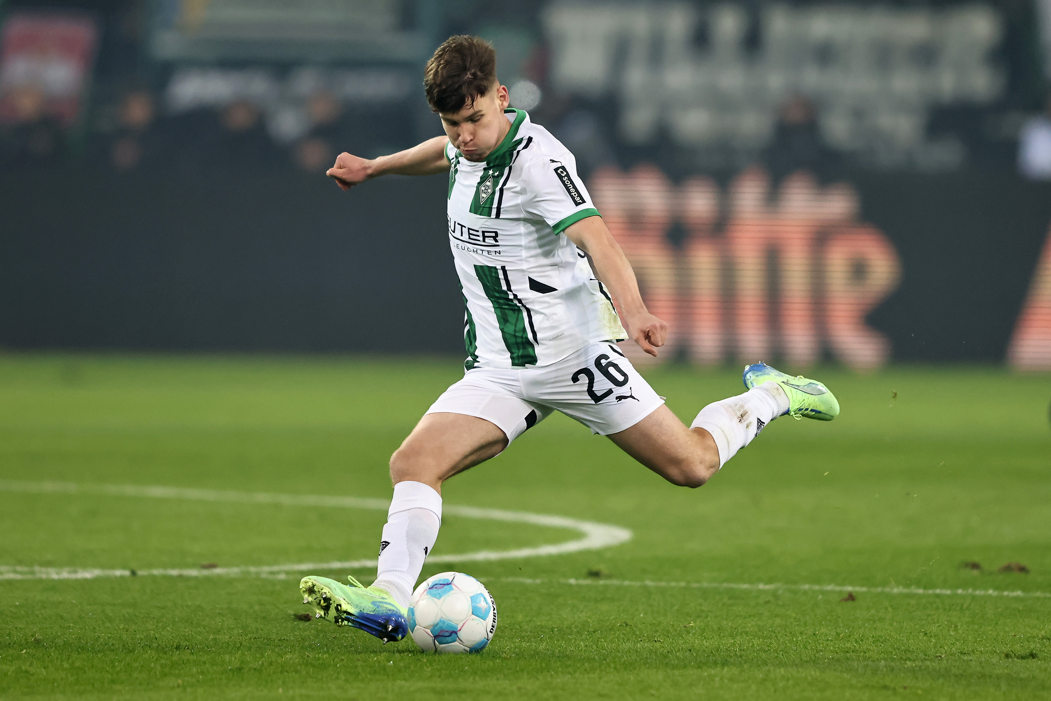 Lukas Ullrich of Moenchengladbach runs with the ball