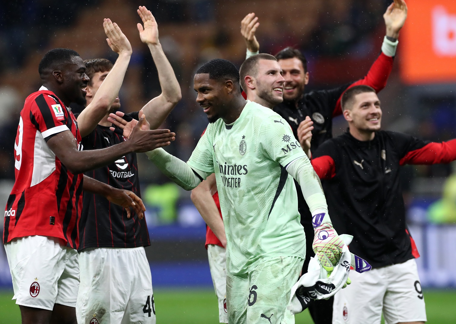 Mike Maignan of AC Milan celebrates victory