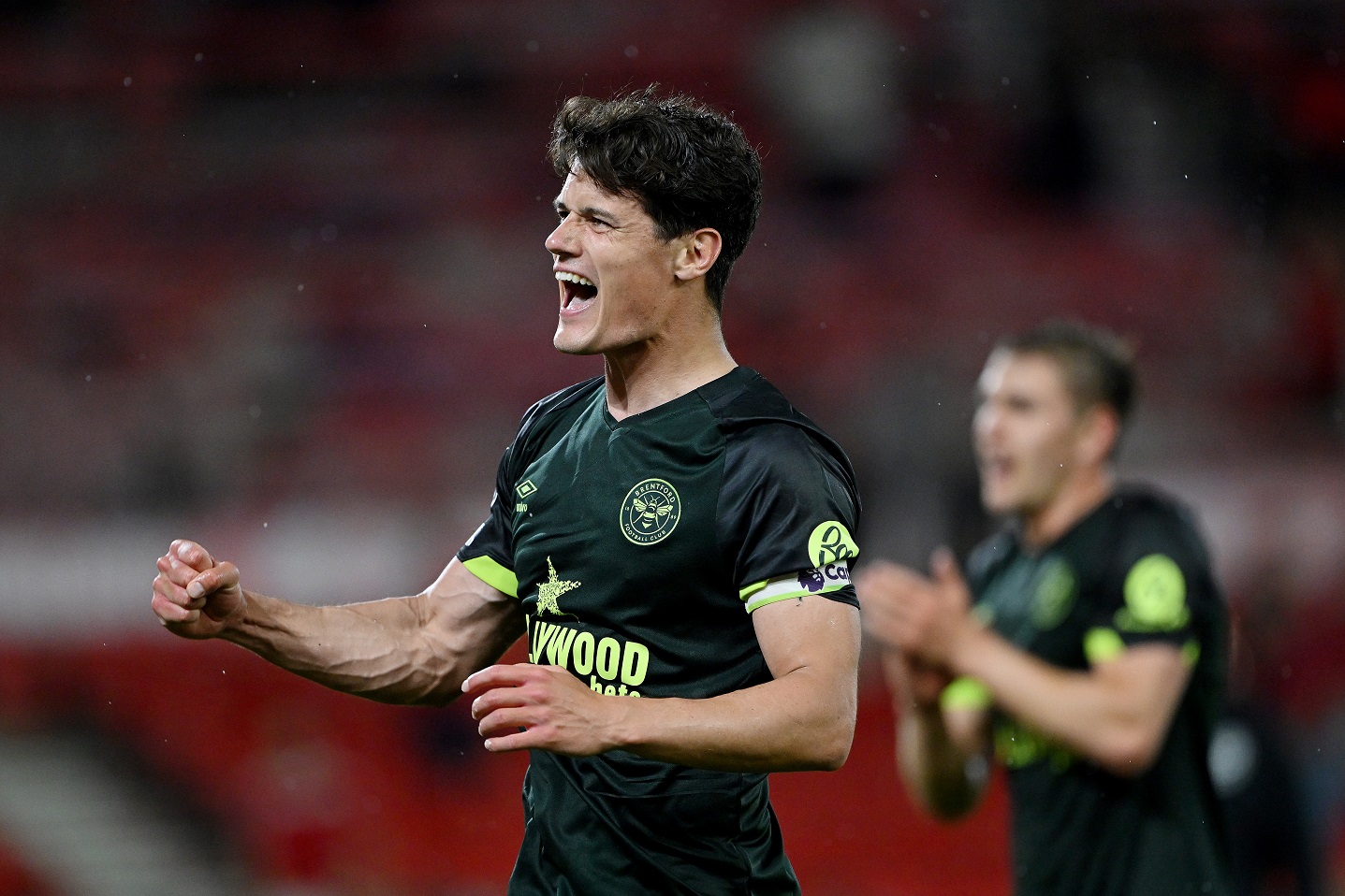Christian Norgaard of Brentford celebrates victory 