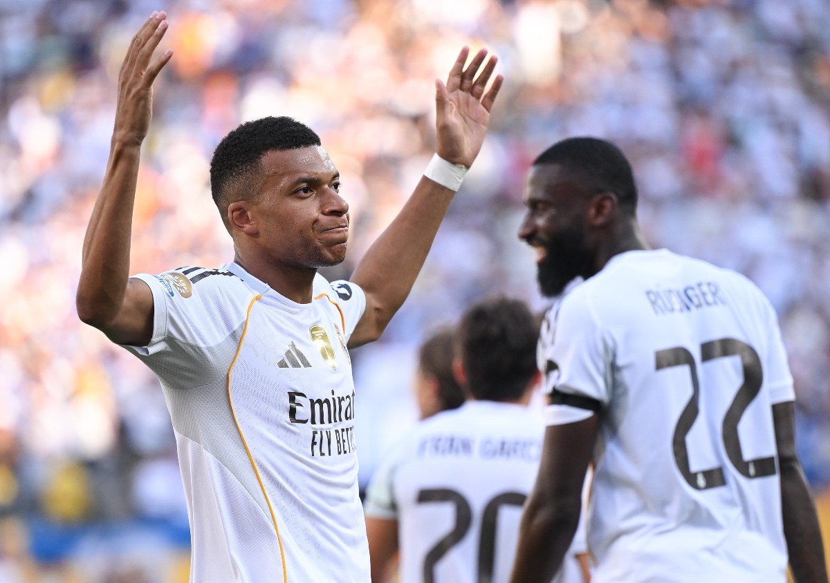 Kylian Mbappe celebrates scoring for Real Madrid against Borussia Dortmund