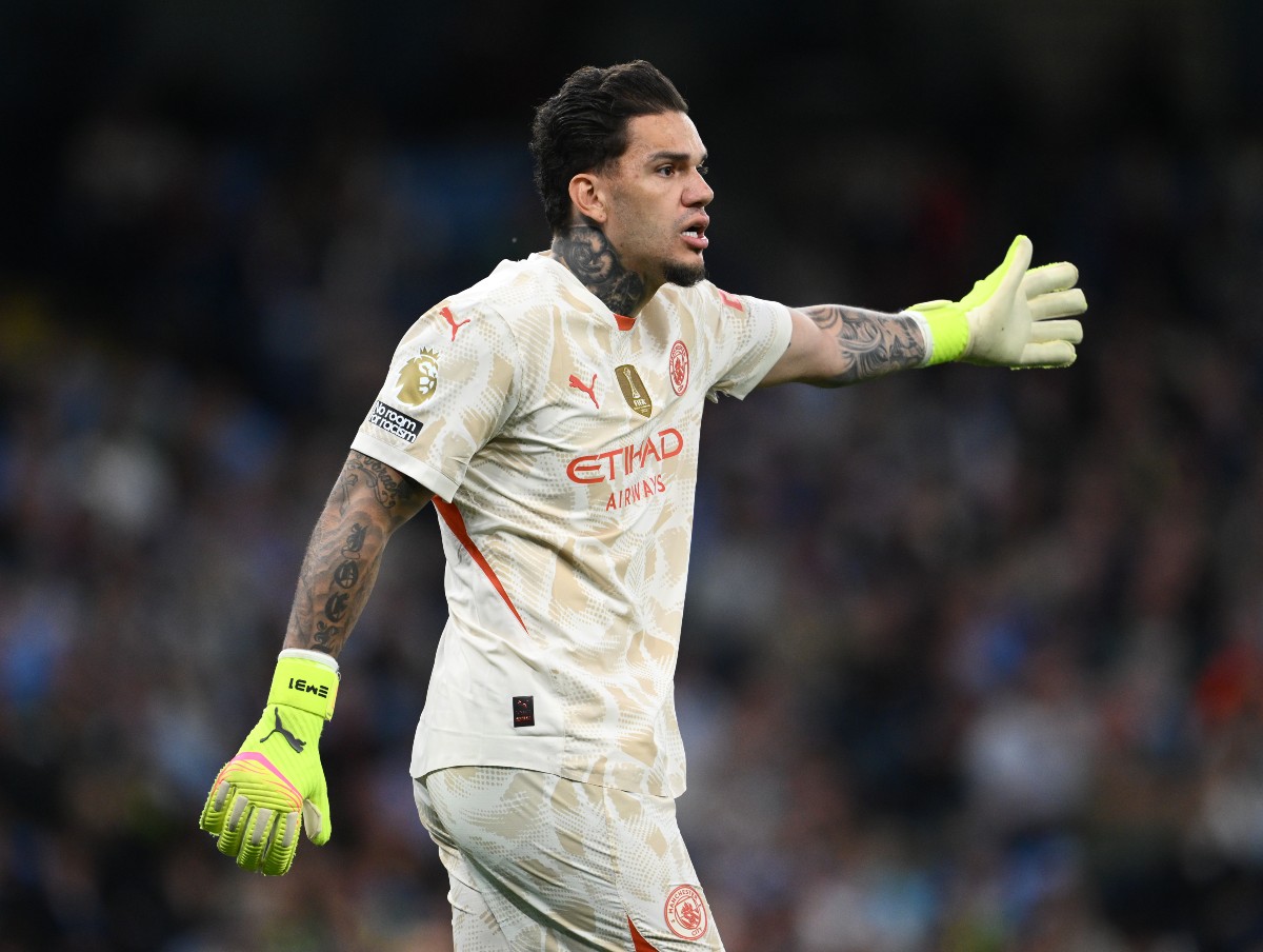 Manchester City goalkeeper Ederson in action