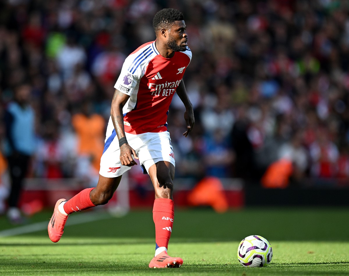 Thomas Party is in action for Arsenal