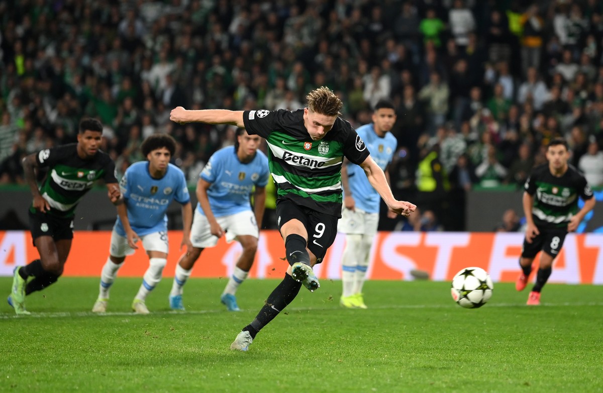Viktor Gyokeres shoots from the penalty spot for Sporting Lisbon against Manchester City