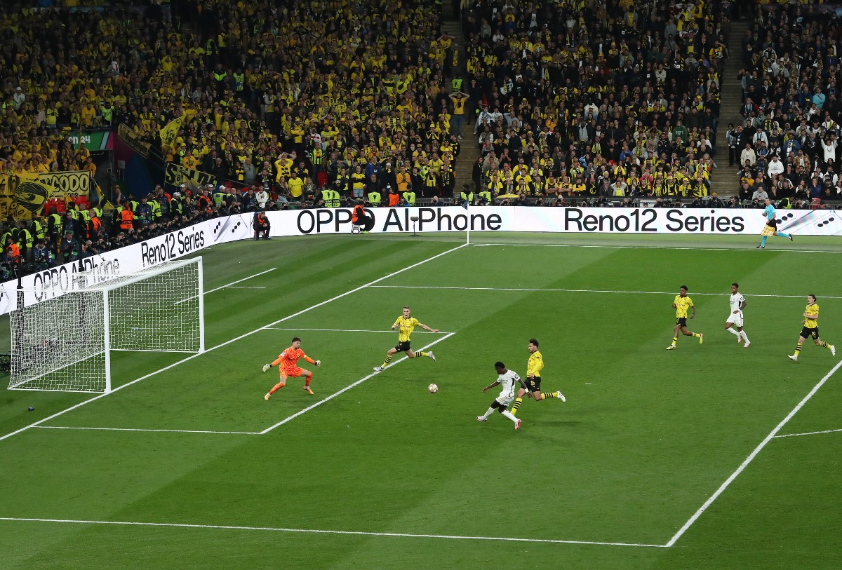 Vinicius Junior scoring for Real Madrid against Borussia Dortmund in the 2024 Champions League final