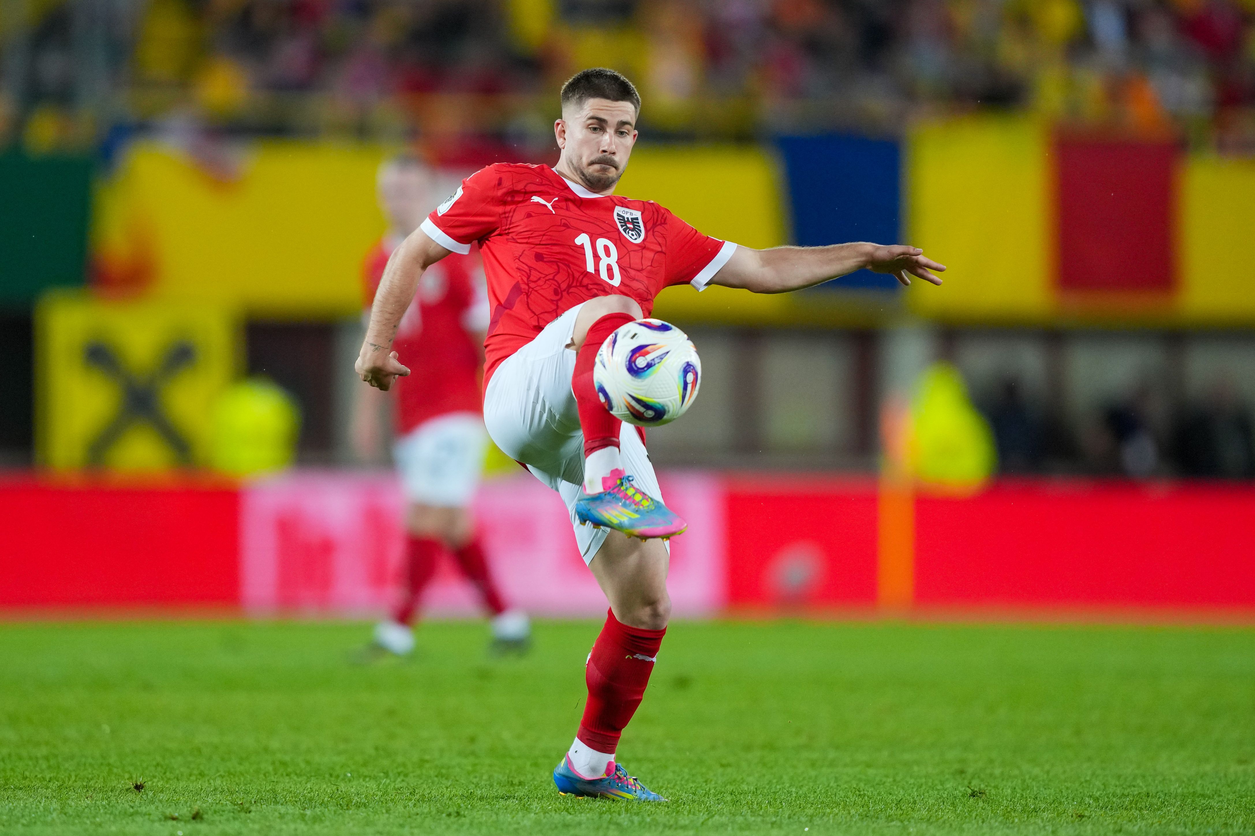 Romano Schmid of Austria passes the ball during the FIFA World Cup 2026 European Qualifier