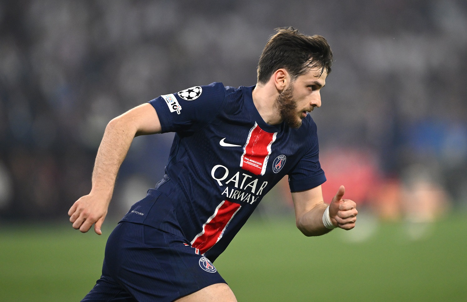 PSG player Khvicha Kvaratskhelia in action