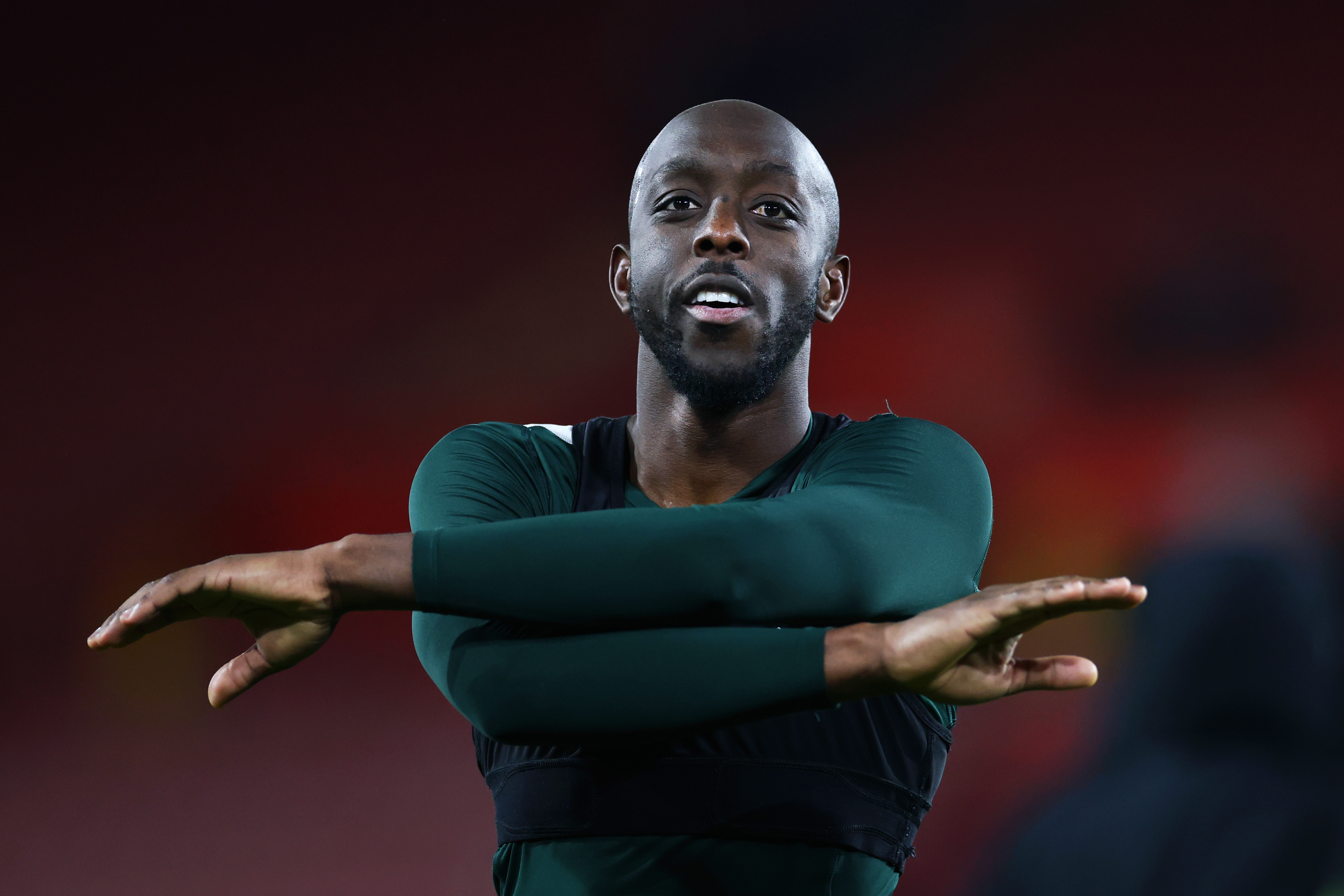 Brentford's Yoe Wissa celebrates the victory in front of the visit supporters