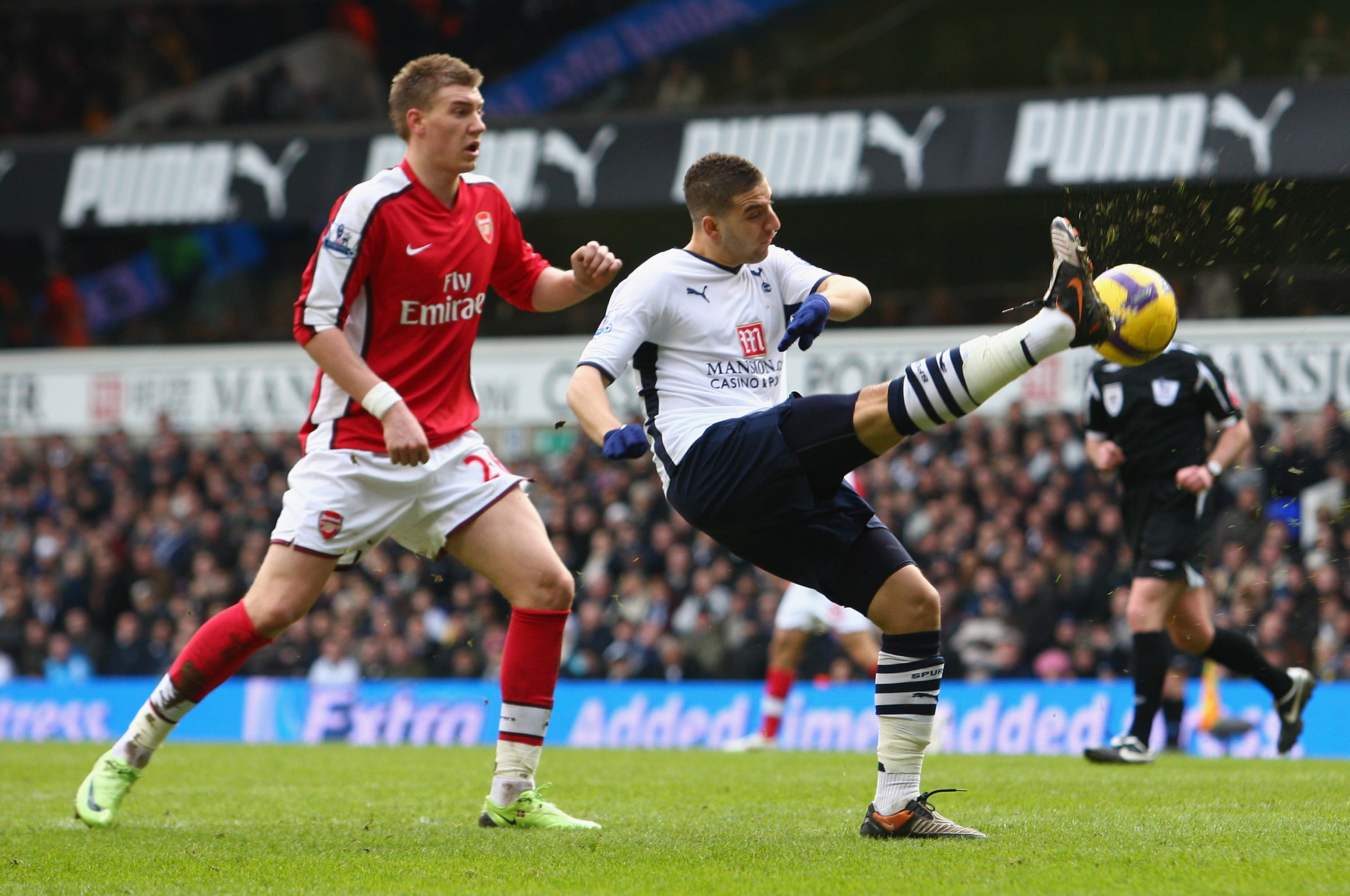 Adel Taarabt of Tottenham clears the ball