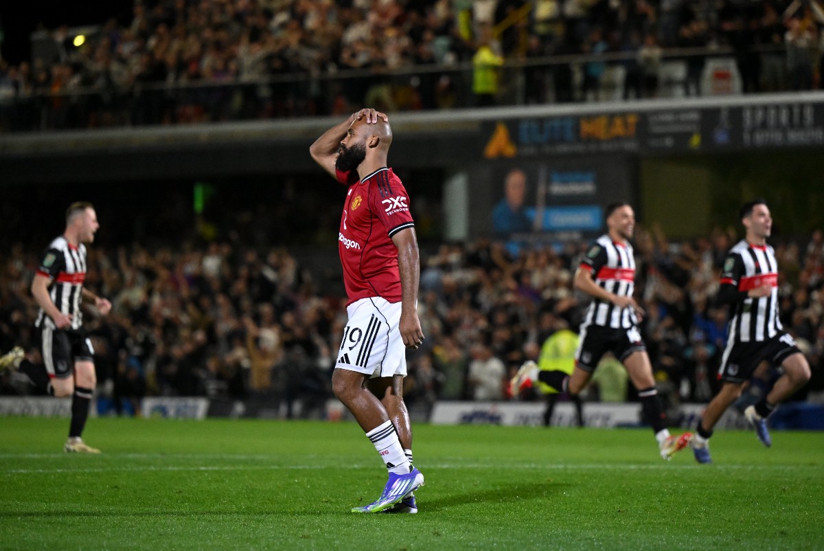 Bryan Mbeumo reacts after missing a penalty for Manchester United