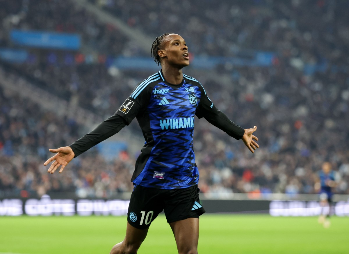 Emanuel Emegha celebrates a goal for Strasbourg