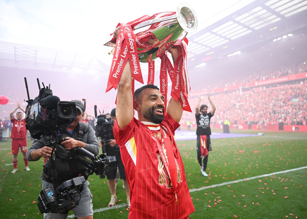Mohamed Salah raises the Premier League Cup in Anfield