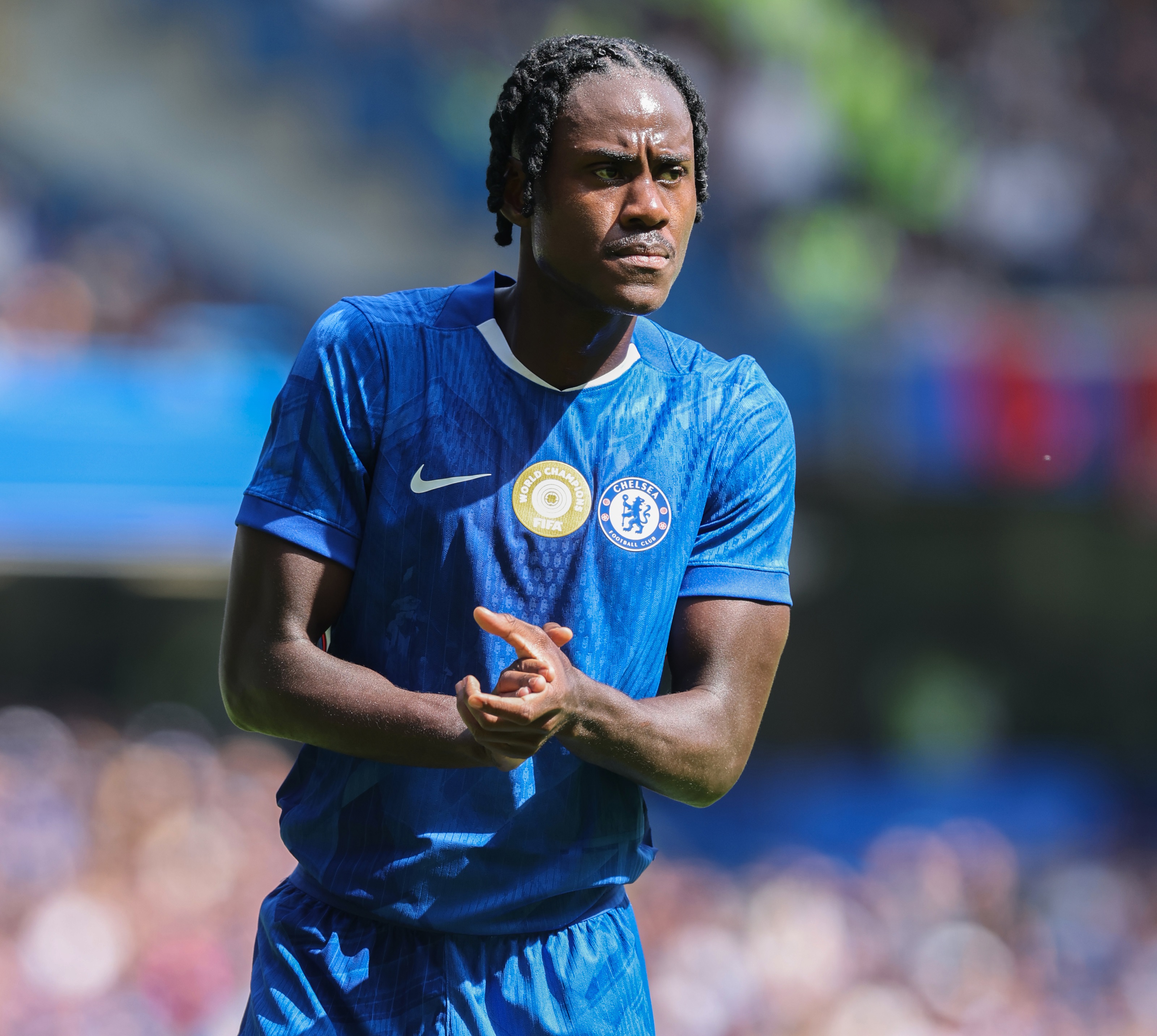 Trevoh Chalobah rubs his hands during Chelsea game.