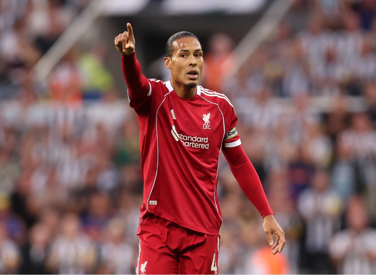 Virgil Van Dijk from Liverpool at work against Newcastle