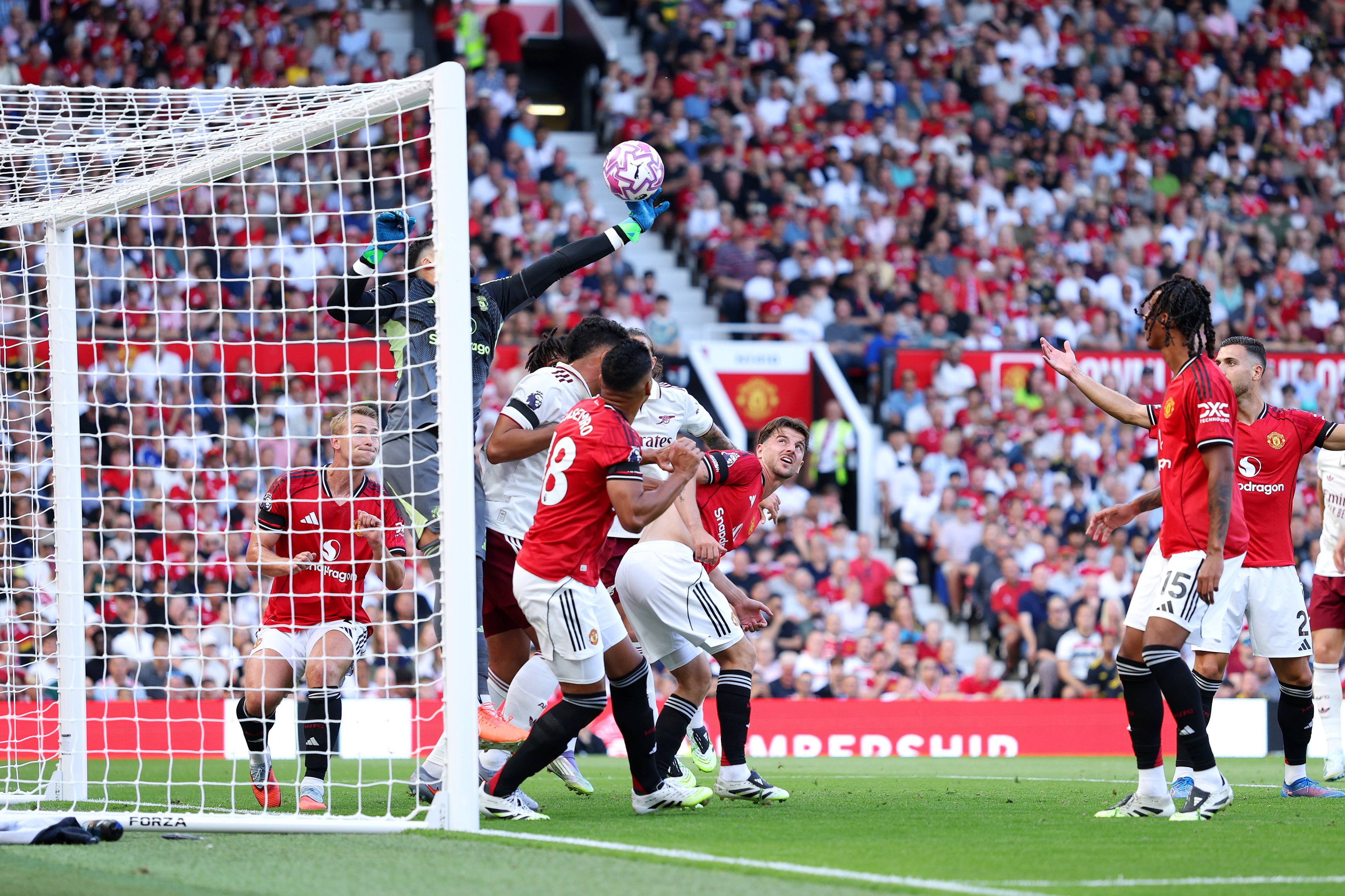 Altay Bayindir of Manchester United fails to save a header which leads to the first goal for Arsenal