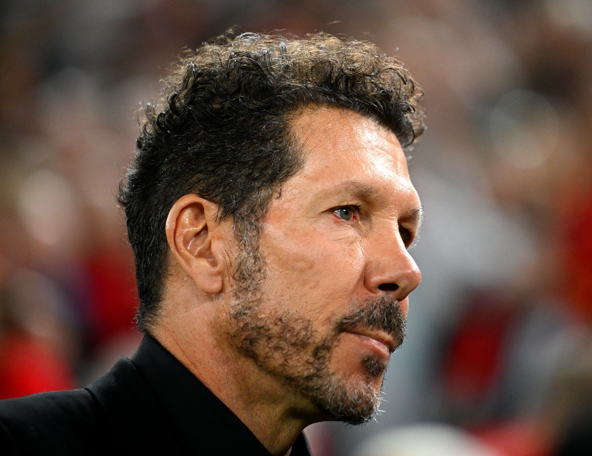 Diego Simeone looks on during Atletico Madrid's defeat vs Liverpool
