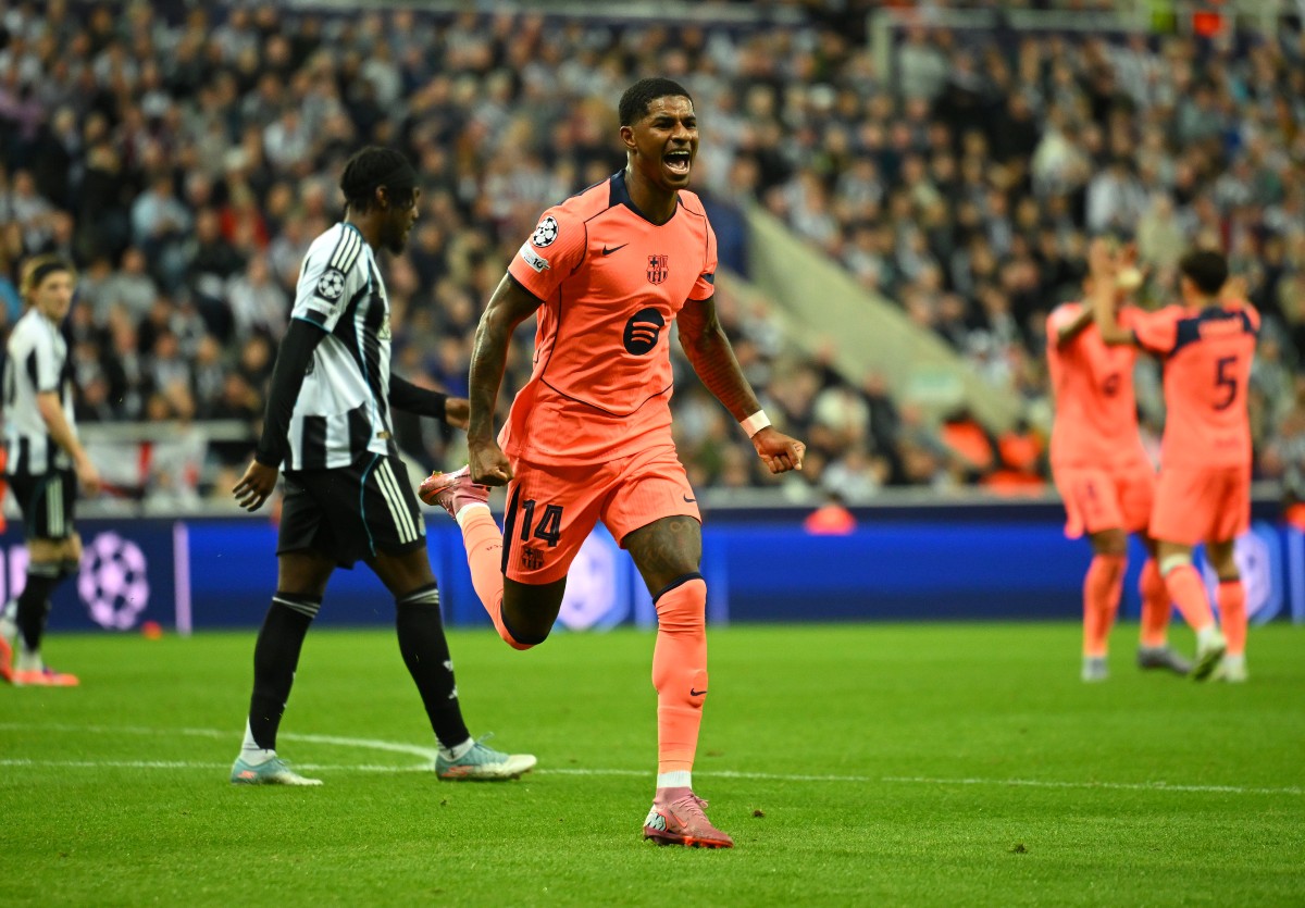 Marcus Rashford celebrates scoring for Barcelona against Newcastle
