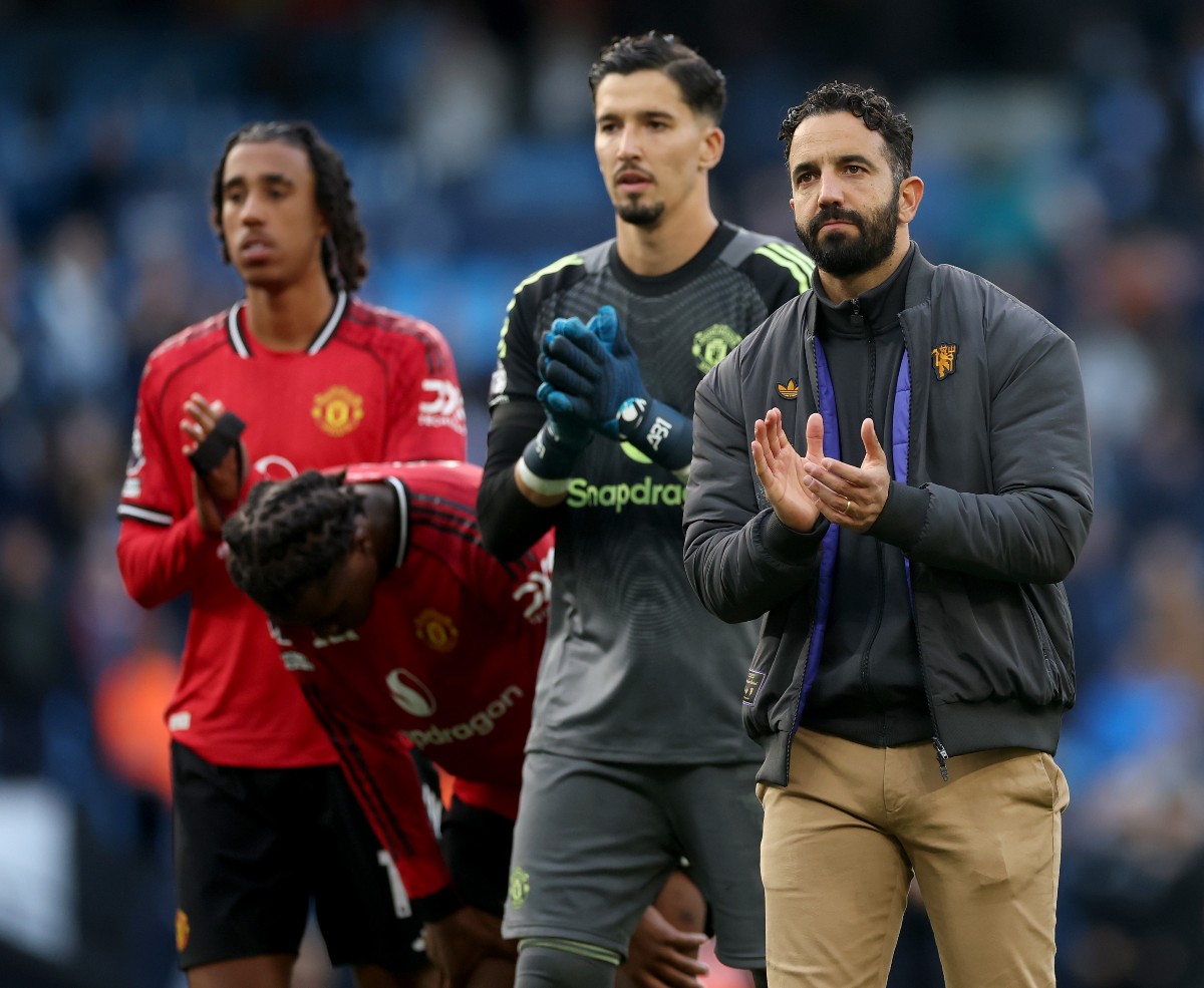 Ruben Amorim applauds the Manchester United fans after the defeat to Manchester City