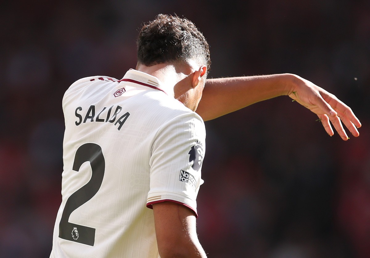 William Saliba reacts after an injury during Arsenal vs Liverpool