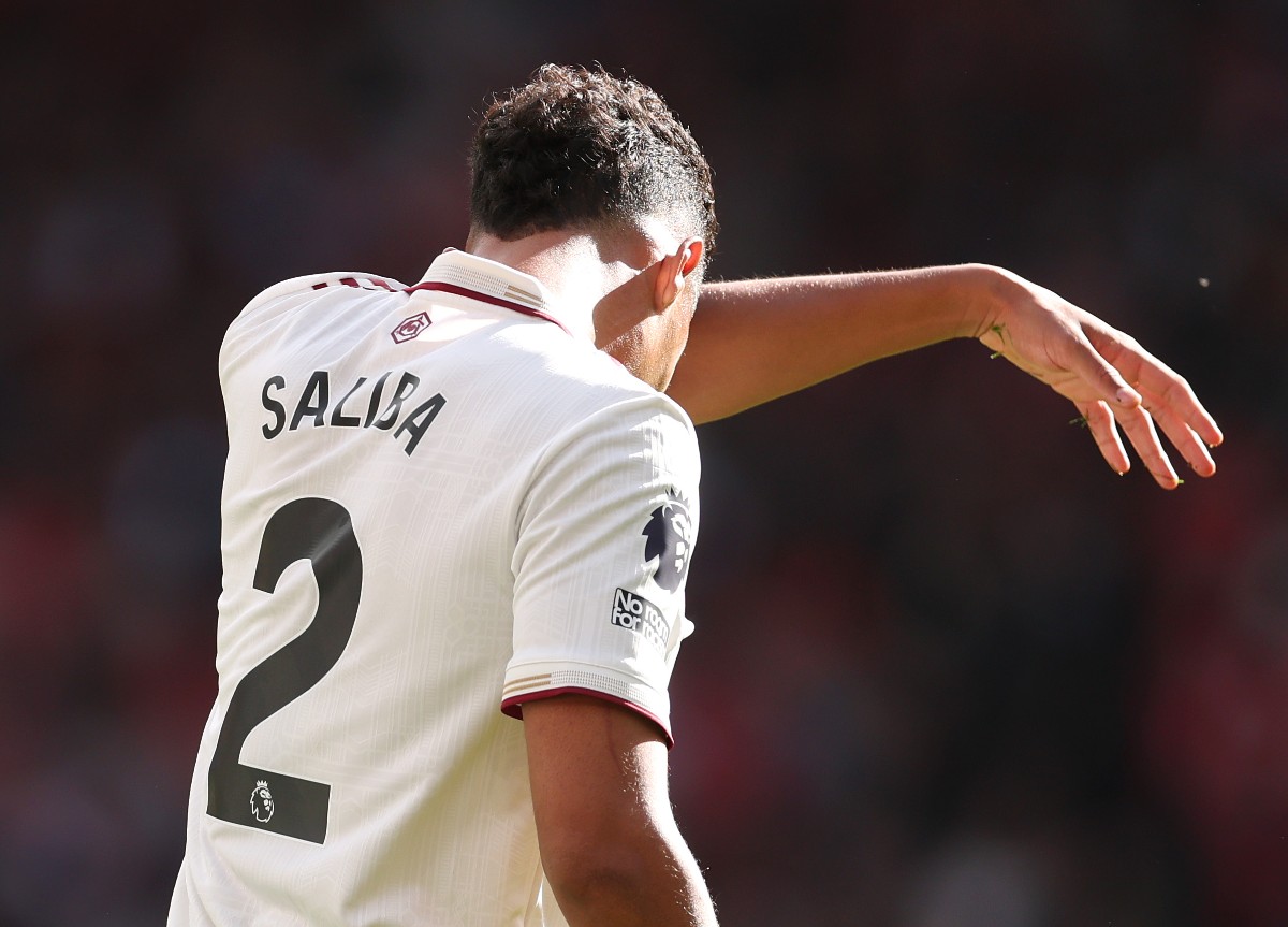 William Saliba reacts as he goes off injured for Arsenal