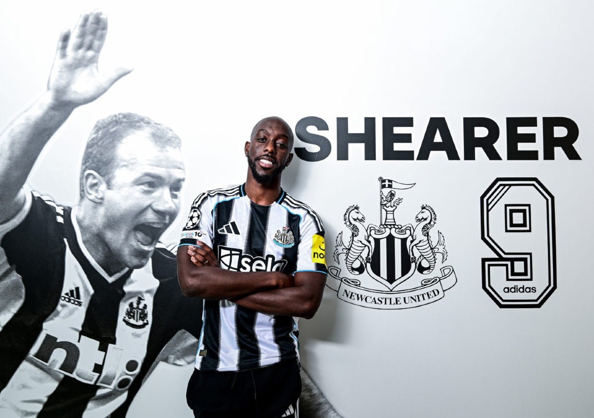 Yoane Wissa poses in a Newcastle shirt