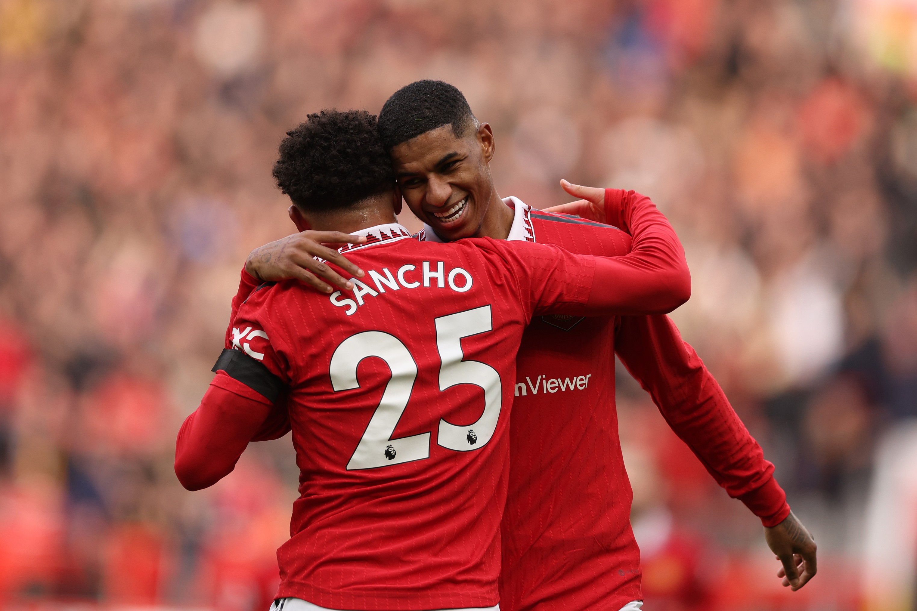 Marcus Rasford of Manchester United celebrates Jadon Sancho after his registration