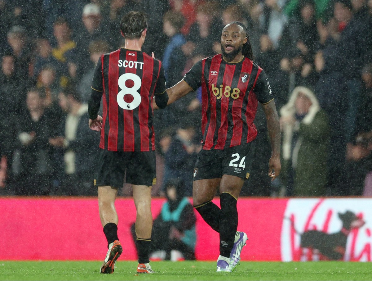 Antoine Semenyo celebrates with Bournemouth teammate Alex Scott