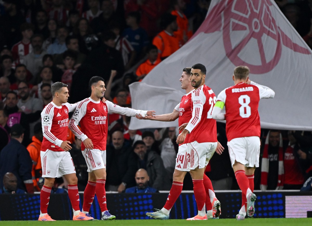 Arsenal players celebrate during the win over Olympiacos